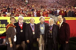 USC’s esteemed National Medal recipients were honored on the field of the 2013 USC-Stanford homecoming game at the L.A. Memorial Coliseum. Left to right: USC Provost Elizabeth Garrett, USC Professor Kevin Starr, USC Trustee and alumnus Andrew Viterbi, USC Professor Morten Lauridsen, USC Professor Solomon Golomb, and USC President C. L. Max Nikias.