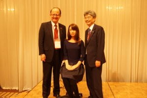 President Nikias and Toshio Hirano, president of Osaka University, with 'Hana', a creation of Osaka University's Intelligent Robotics Laboratory.